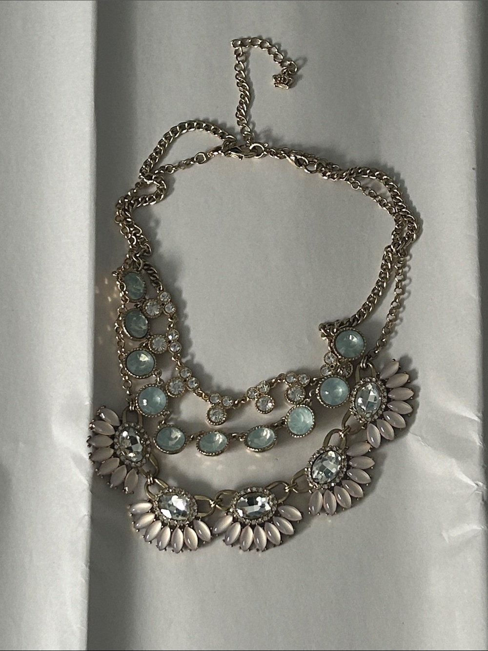 Gold-Tone Multi Strand Statement Necklace With Circular and Oval Accents